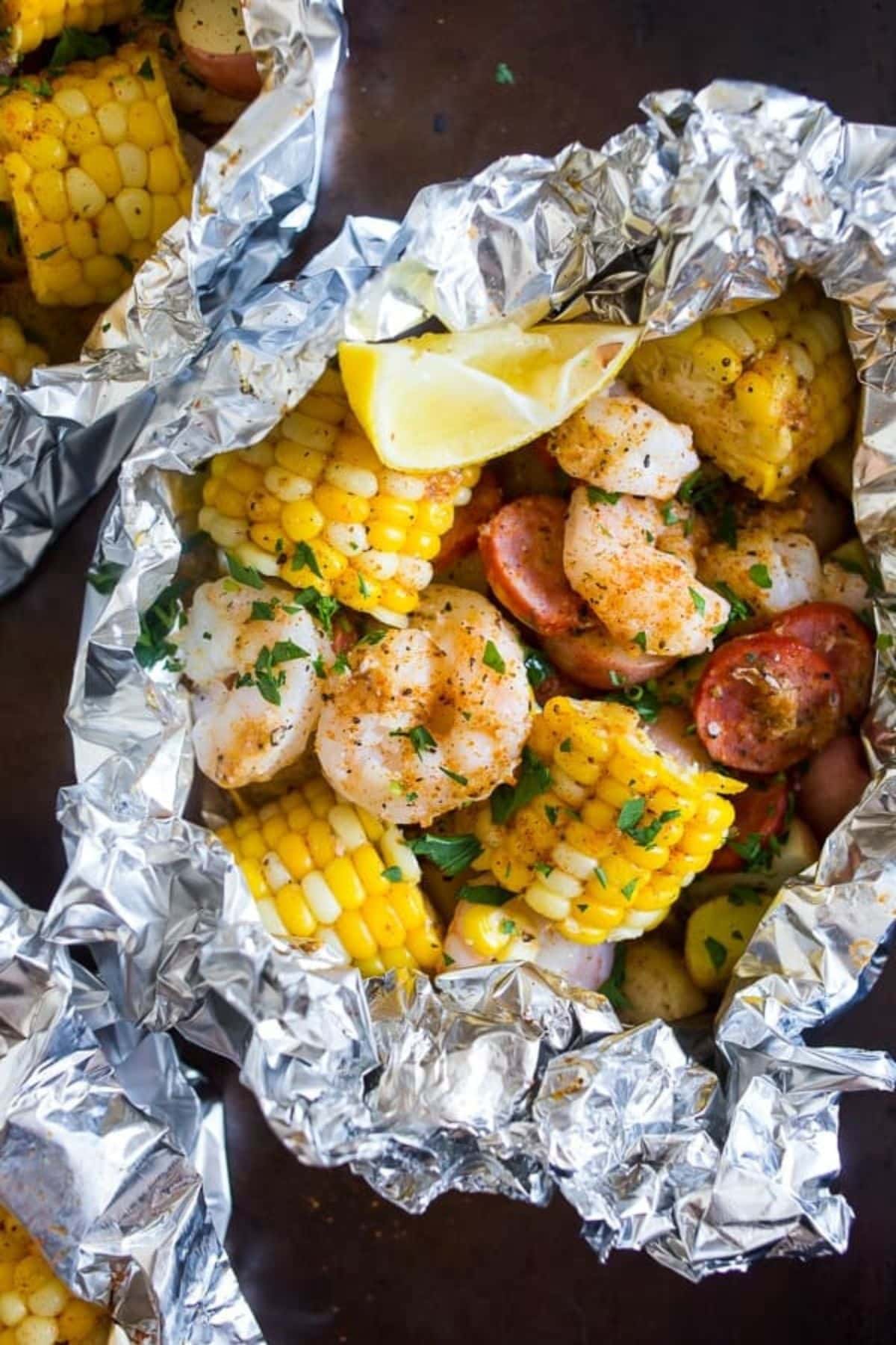 Shrimp and corn in foil.